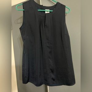 The brand is Cabi, the size is small, and the color is a dark navy blue/black